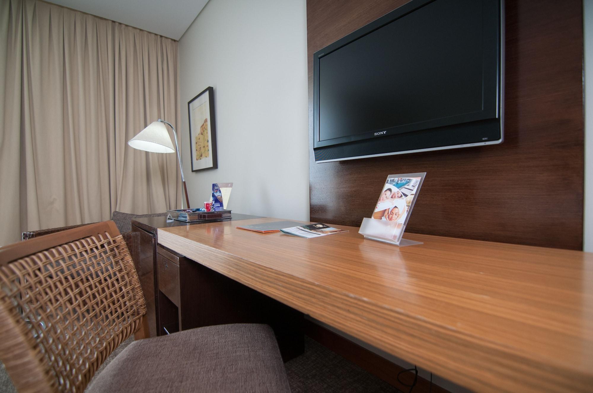 Enjoy Coquimbo Hotel Exterior photo A television in a hotel room